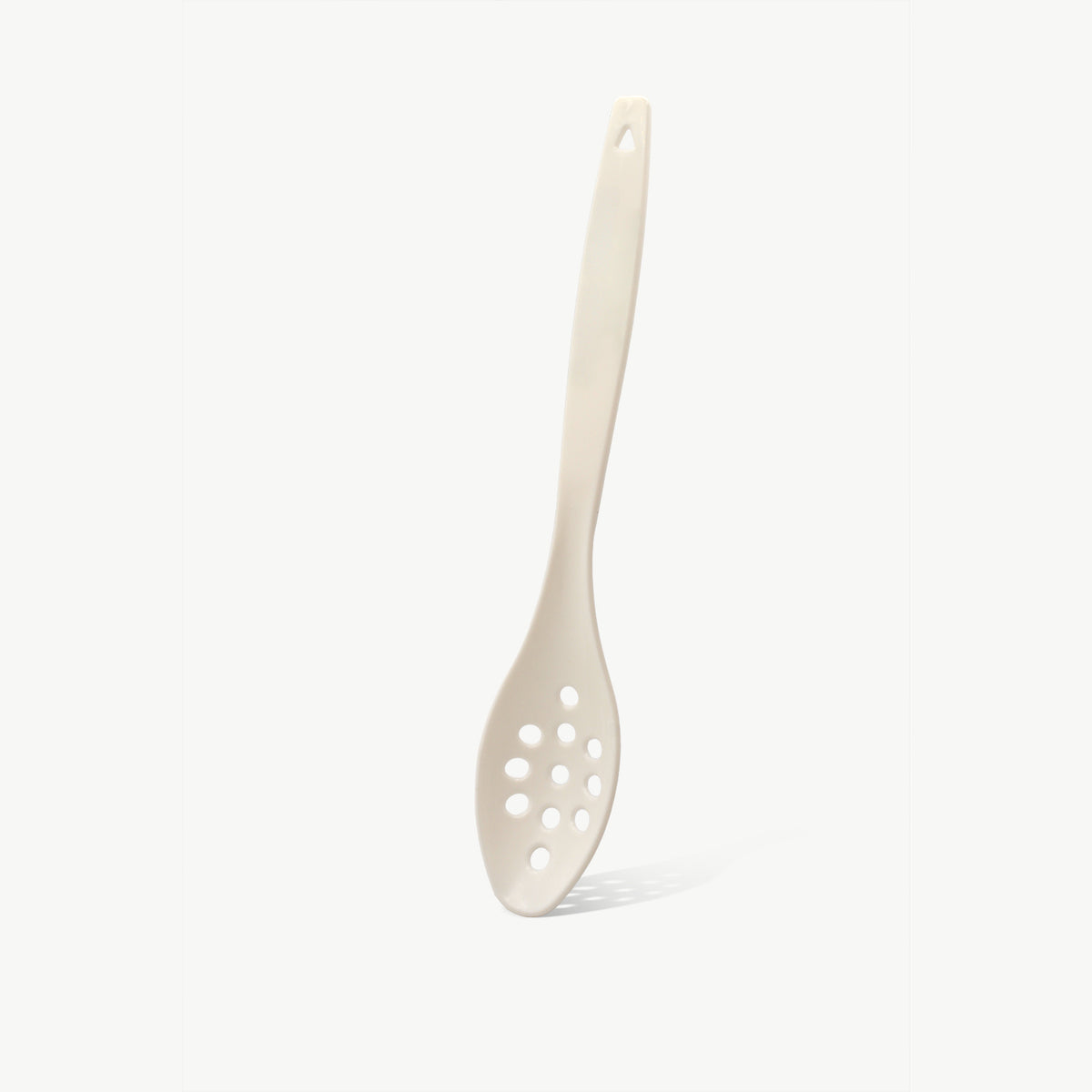 Customizable perforated serving spoon in white by Lotech Sales